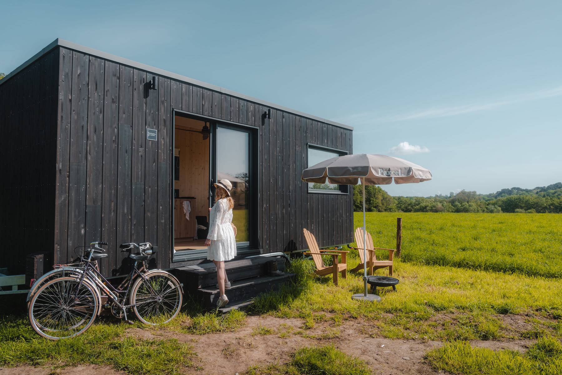 Woman entering the Tiny House