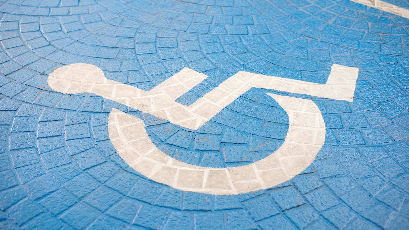Sol avec logo handicap